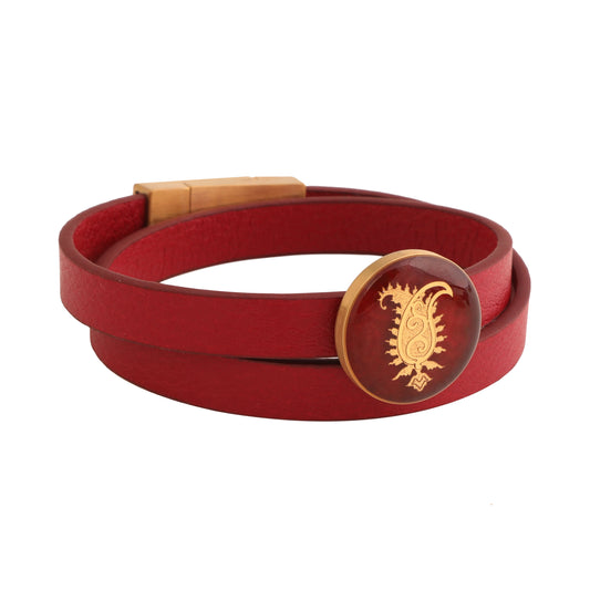 Leather bracelet with paisley design made of 24 carat gold leaf and agate stone