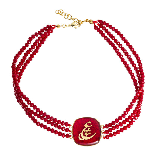 Necklace, Eschgh (Love) design made of 24 carat gold leaf and coral stone